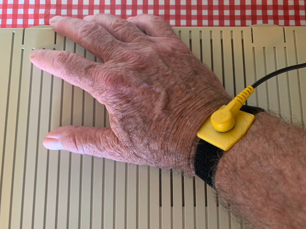 hand wearing ground wire