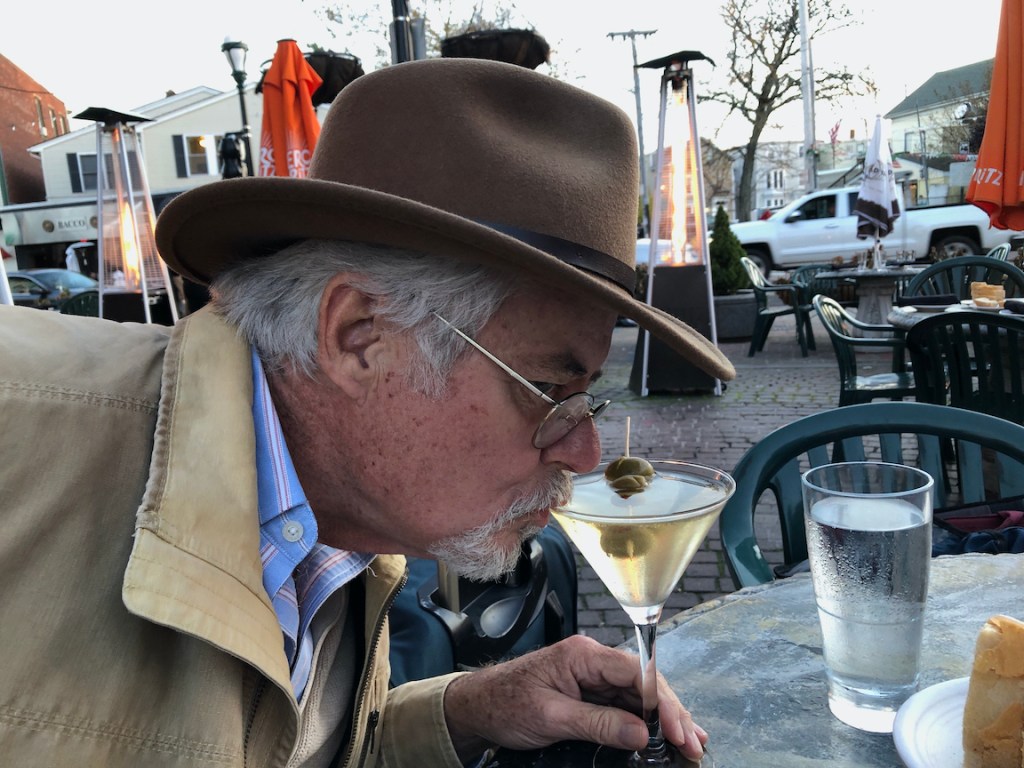 Man drinking martini