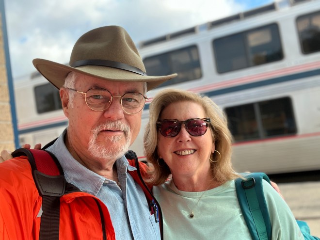 Young lovers ready for railroad adventures.